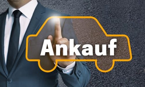 ankauf (in german purchase) auto touchscreen is operated by businessman concept.